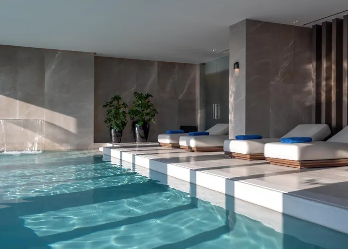 Курортный комплекс Sandblu Santorini, Lxr &